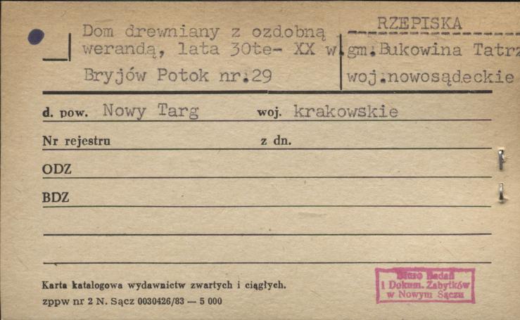 dom z ozdobną werandą, skan 1
