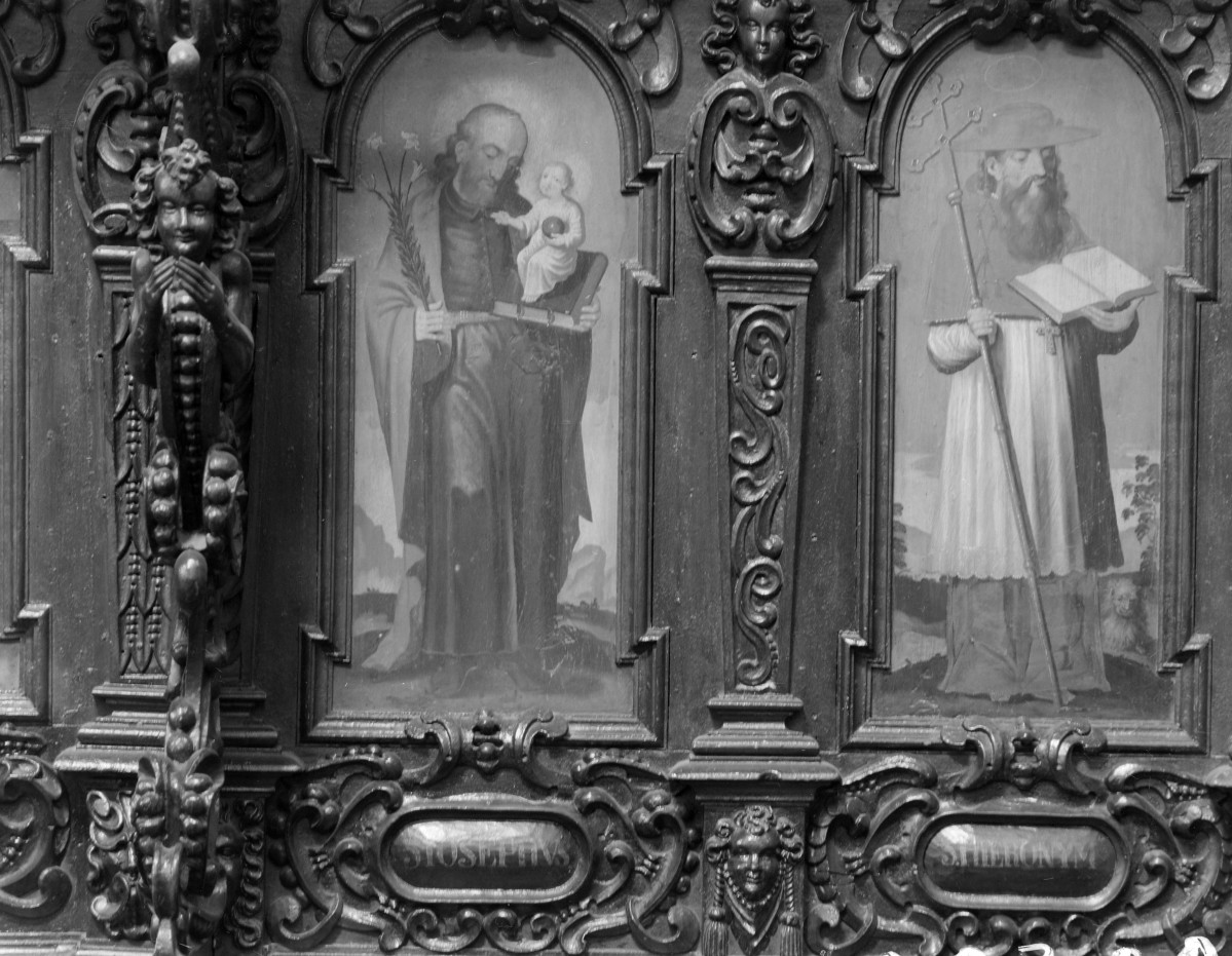Kościół pw. NMP i św. Mikołaja - wnętrze: stalle. Zaplecki z wizerunkami świętych - św. Józef i św. Hieronim., skan 1