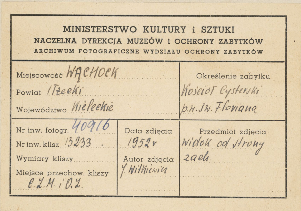 Zespół opactwa Cystersów - widok od strony  zach. na fasadę kościoła oraz fragment klasztoru - metryczka, skan 1