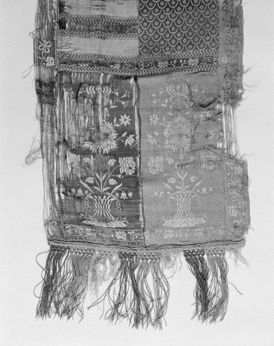 Muzeum Zamkowe - zbiory - pas jedwabny czterostronny - Korzec /Franciszek Selimand i spółka 1791 - 1800 rok/ - głowa i wciąża /fragment/ - awers, skan 1