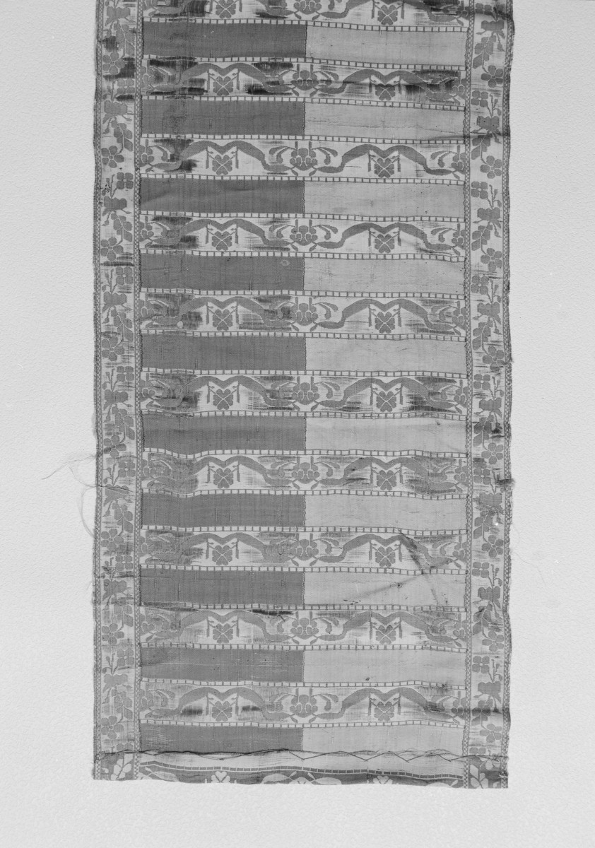 Muzeum Archidiecezjalne - zbiory - pas jedwabny trójstronny - Słuck /Jan Madżarski 1767 - 1780 rok/ - głowa i wciąża /fragment/ - awers, skan 1