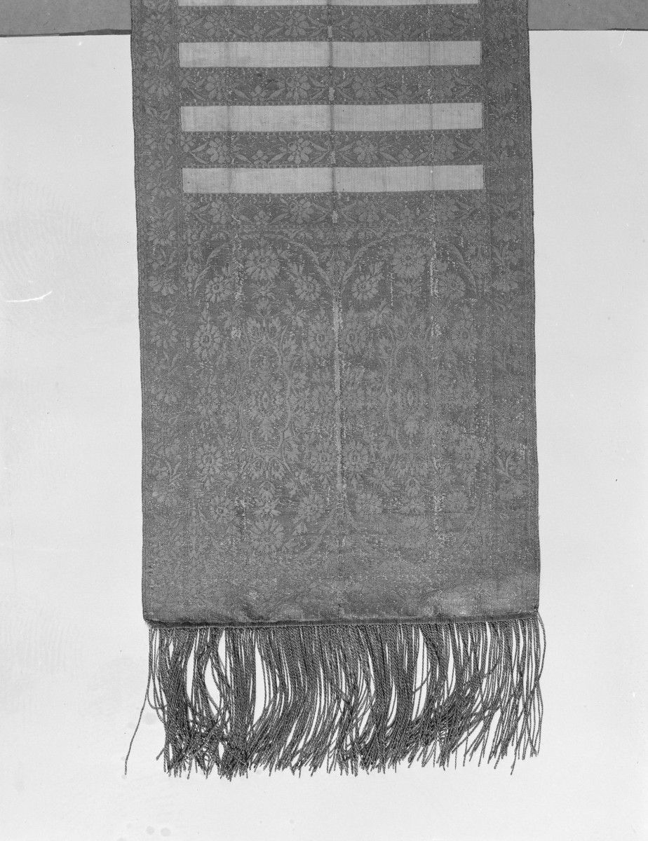 Centralne Muzeum Włókiennictwa - zbiory - pas lity czterostronny - Kraków /Franciszek Masłowski 1781 - 1806 rok/ - głowa i wciąża /fragment/ - awers, skan 1