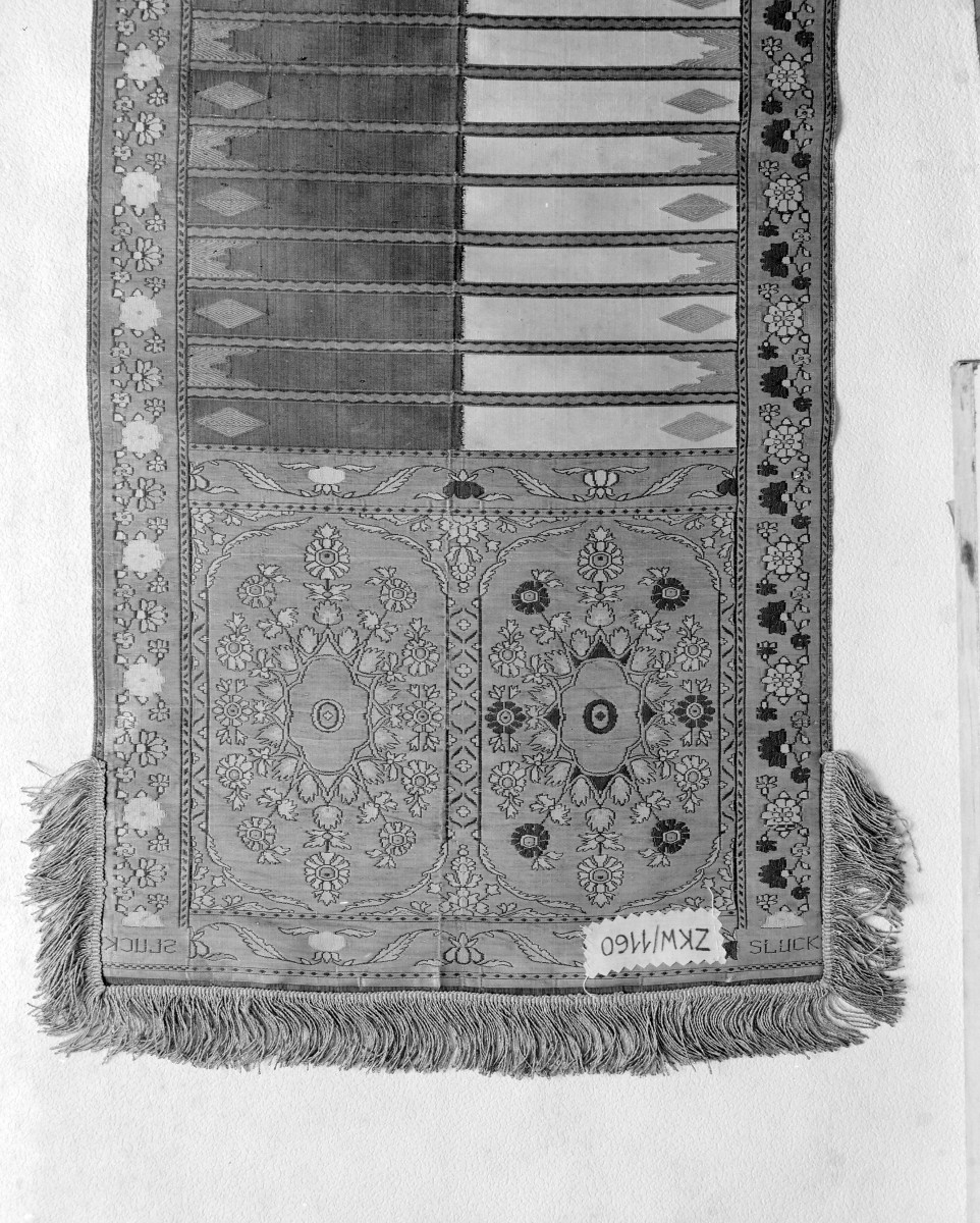 Zamek Królewski - zbiory - pas lity czterostronny - Słuck /Jan Madżarski 1767 - 1780 rok/ - głowa i wciąża /fragment/ - awers, skan 1