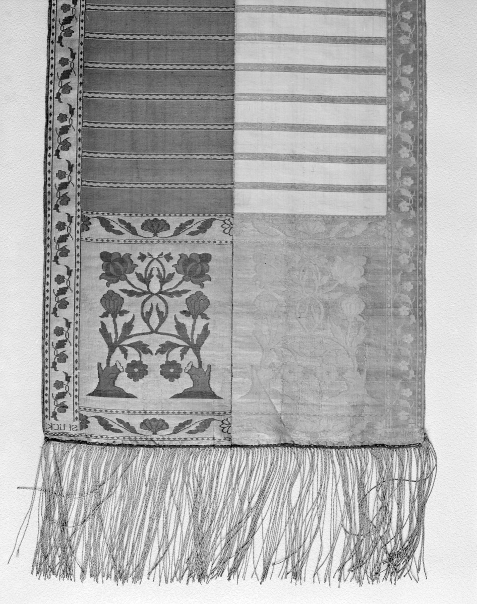 Muzeum Zamkowe - zbiory - pas lity czterostronny - Słuck /Jan Madżarski 1767 - 1780 rok/ - głowa i wciąża /fragment/ - awers, skan 1