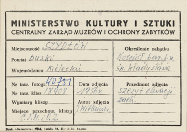 Kościół parafialny  - widok na górną część fasady - metryczka, skan 1