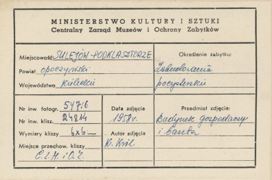 Zespół opactwa cystersów - widok od strony płd. -  zach. na wieżę Muzyczną i przyległe budynki gospodarcze - metryczka, skan 1