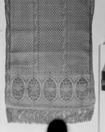 Centralne Muzeum Włókiennictwa - zbiory - pas lity jednostronny - Kaszan /1700 - 1722 rok/ - głowa i wciąża /fragment/ - awers, skan 1